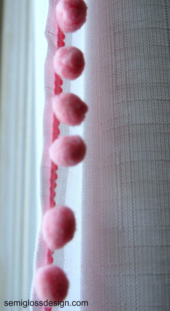 pink pom pom fringe on curtains