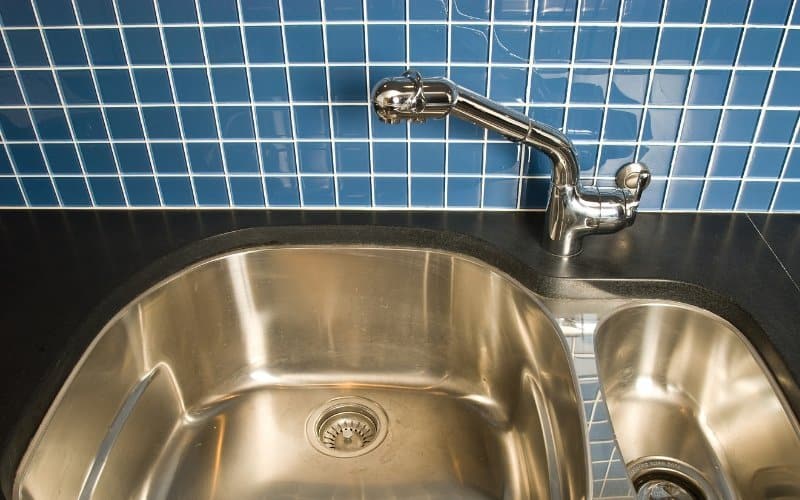 tiled backsplash and sink