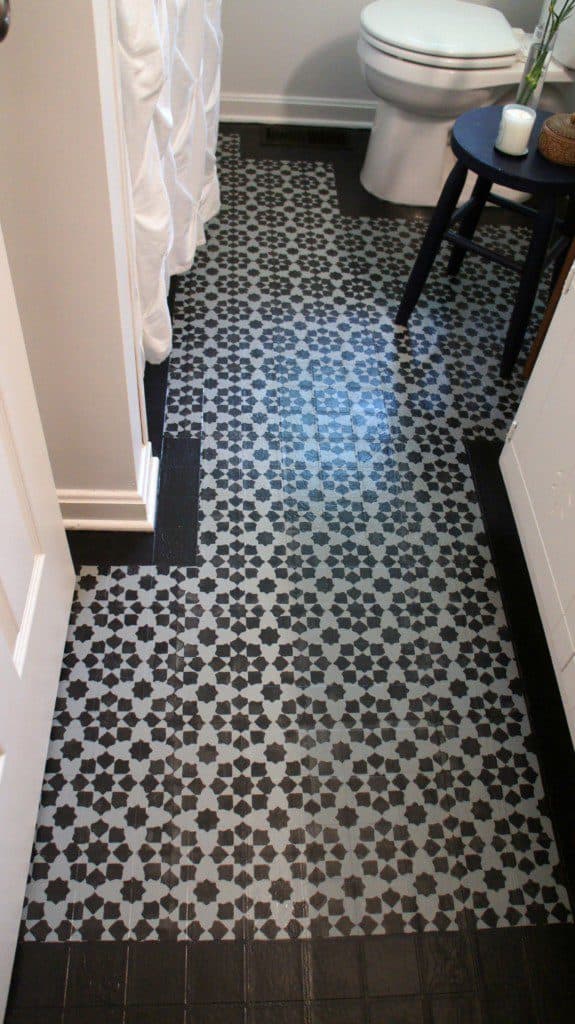 painted and stenciled vinyl floor in bathroom