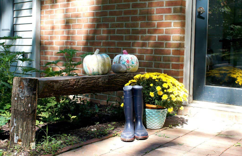 painted pumpkins on porch