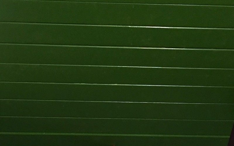 green shiplap walls