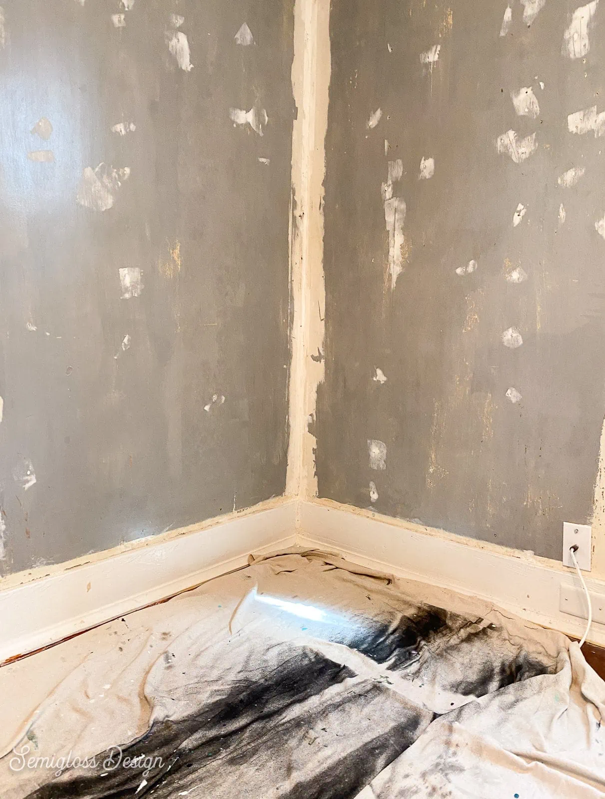 gray walls with repairs