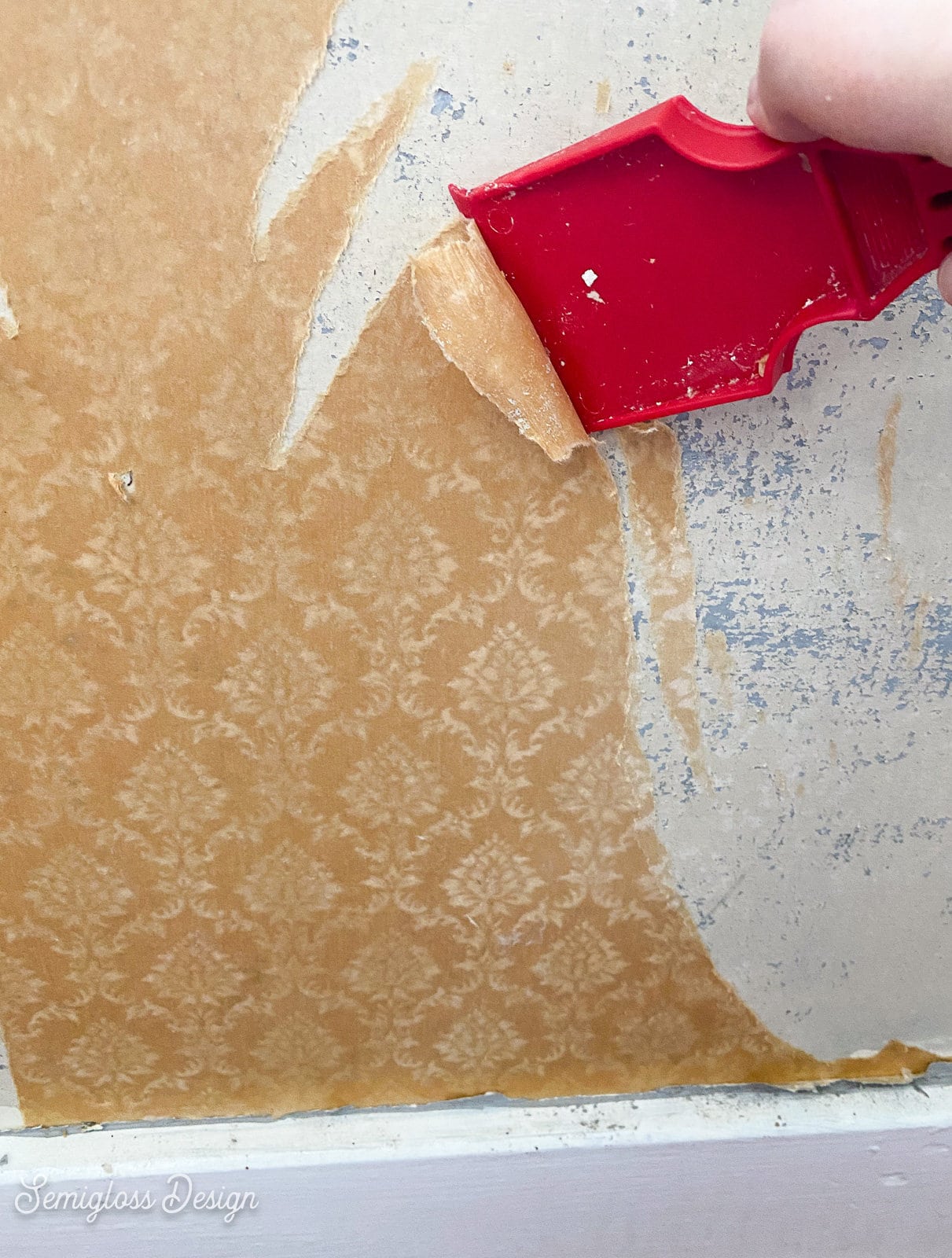 scraper removing wallpaper