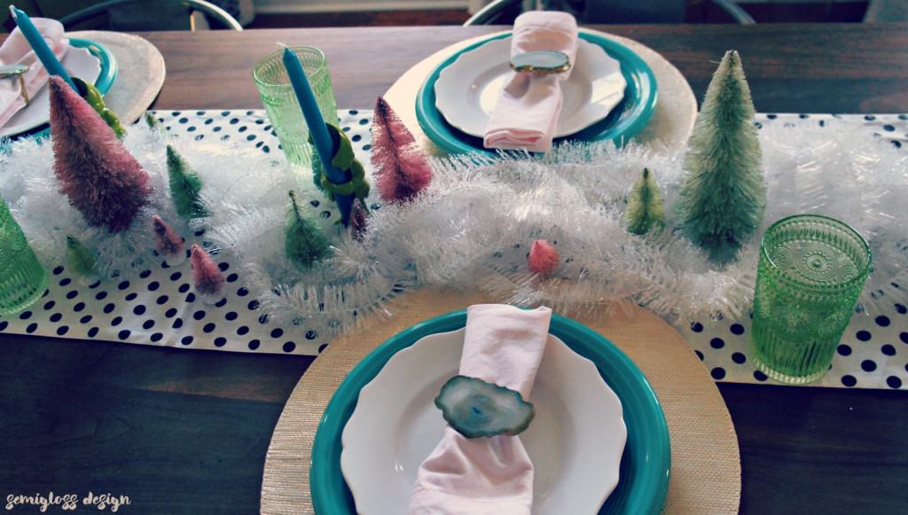 Bottle brush trees, agate and tinsel make a magical winter tablescape. 