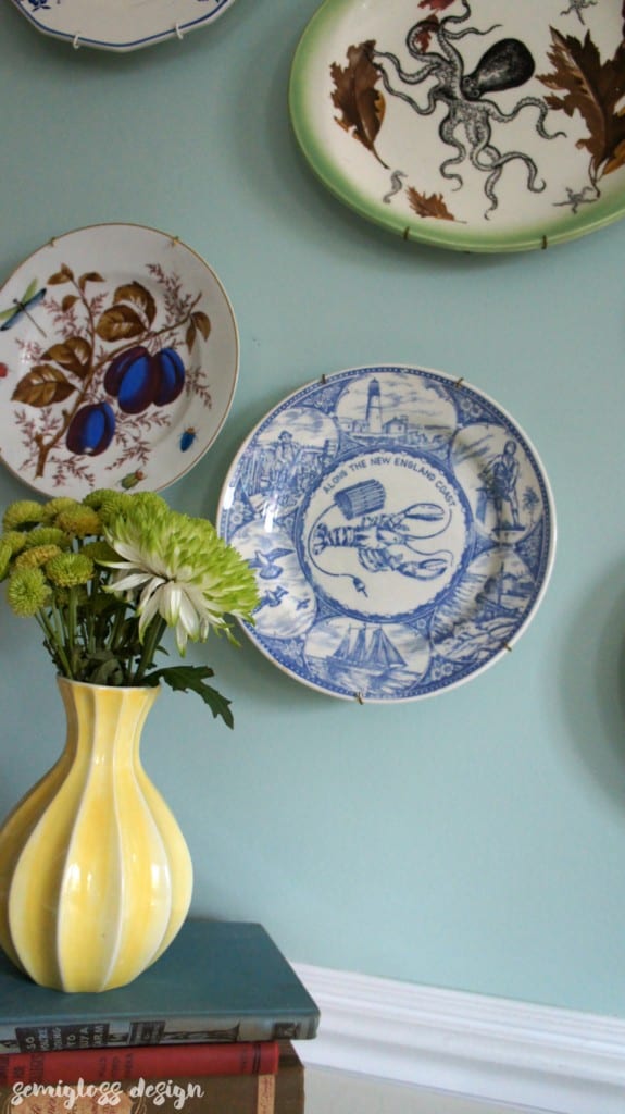 Make your own decorative plates for a unique plate wall. This easy DIY is the perfect way to add unique personality to your decor!