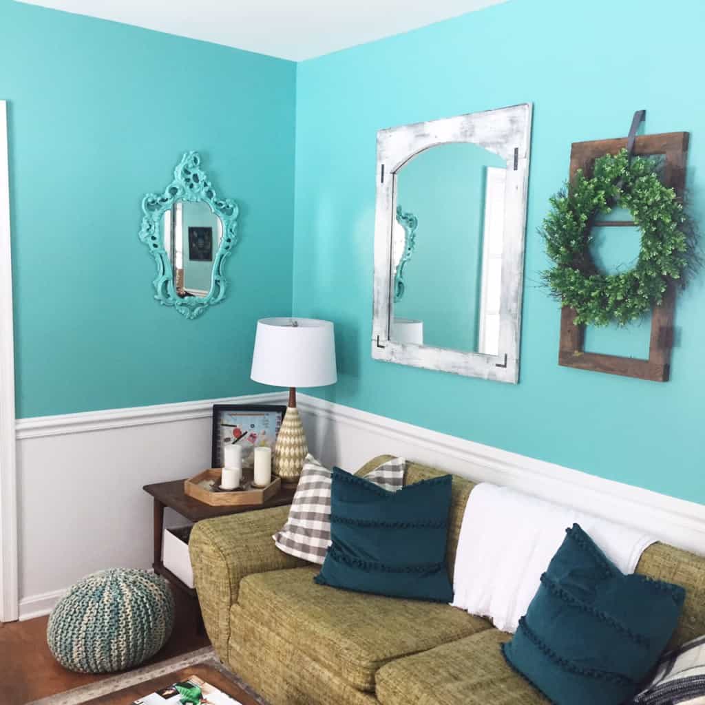 Learn how to use an Indian inlay stencil for a mirror makeover! This easy DIY makeover is a great way to add a boho touch to your home!