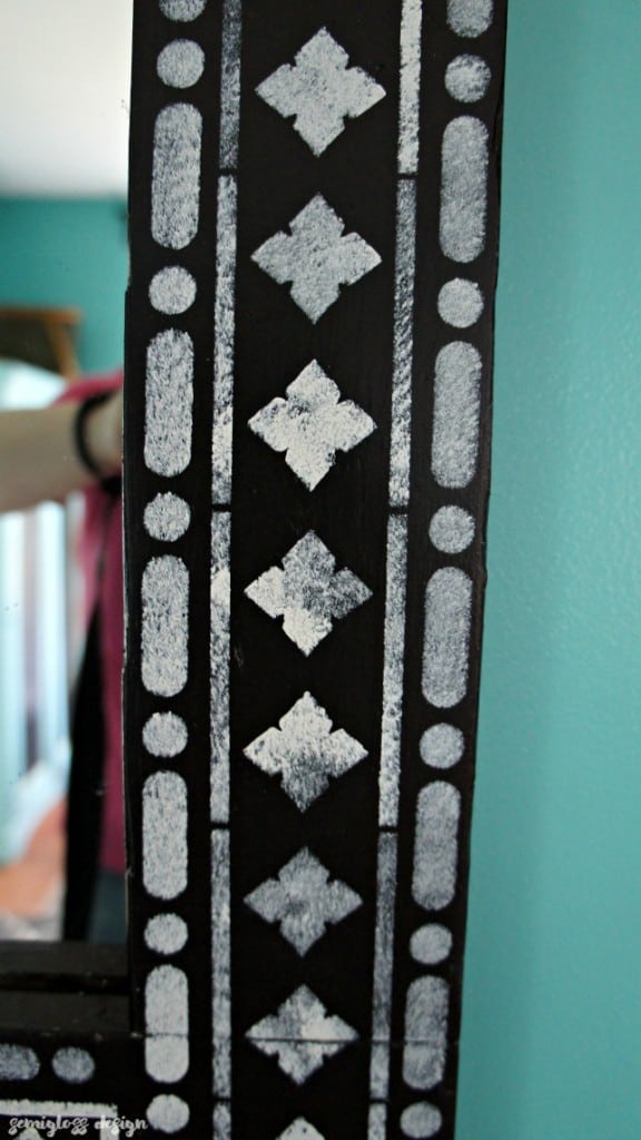 Learn how to use an Indian inlay stencil for a mirror makeover! This easy DIY makeover is a great way to add a boho touch to your home!