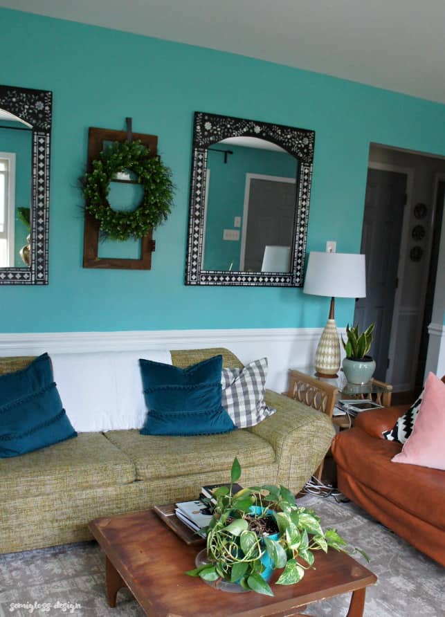 Learn how to use an Indian inlay stencil for a mirror makeover! This easy DIY makeover is a great way to add a boho touch to your home!