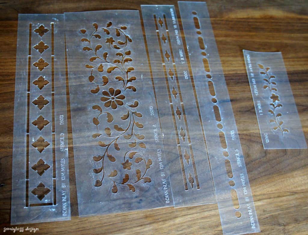 Learn how to use an Indian inlay stencil for a mirror makeover! This easy DIY makeover is a great way to add a boho touch to your home!