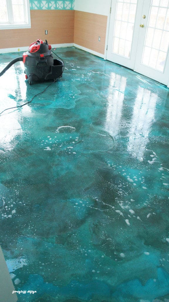 Rinse acid stain from stained concrete floor