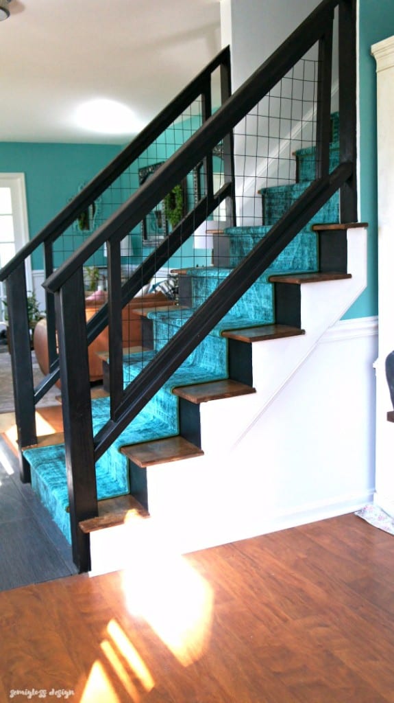 modern staircase makeover with metal grid fencing