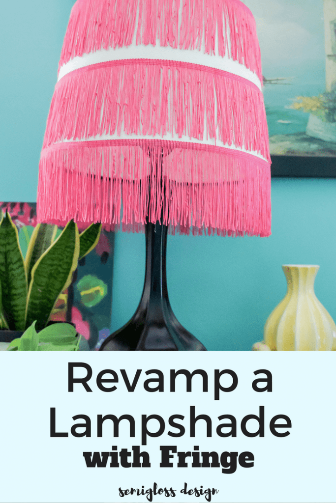 pink fringe lampshade on black lamp