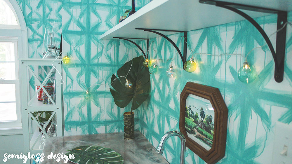 Tropical tiki sunroom reveal. If you love colorful makeovers, this is for you. This room is filled with budget friendly techniques for a unique look!