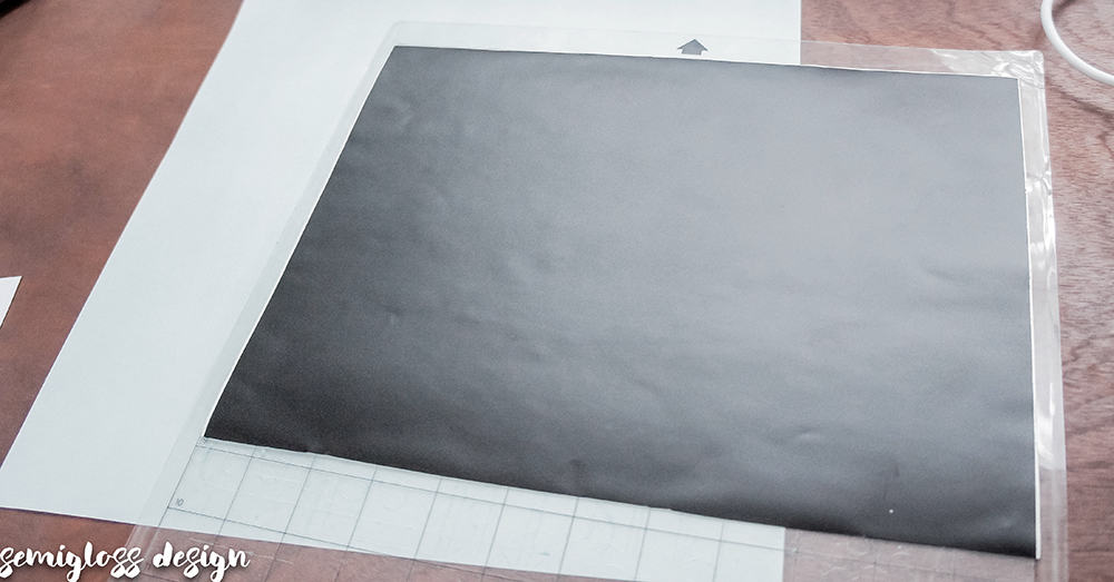 Place vinyl on mat