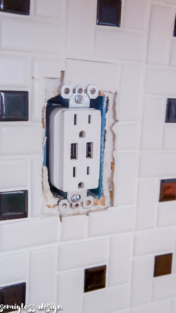 screw the outlet into place