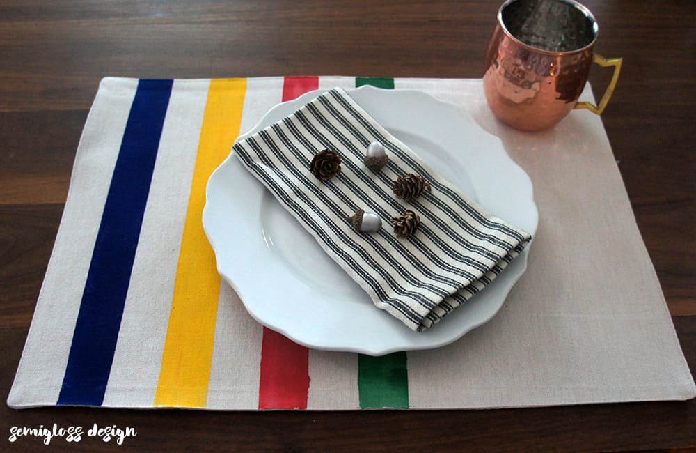 Make your own camp blanket inspired placemats for your fall table. These DIY placemats are easy and quick to make. 