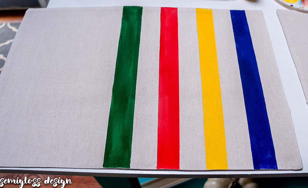 Make your own camp blanket inspired placemats for your fall table. These DIY placemats are easy and quick to make. 