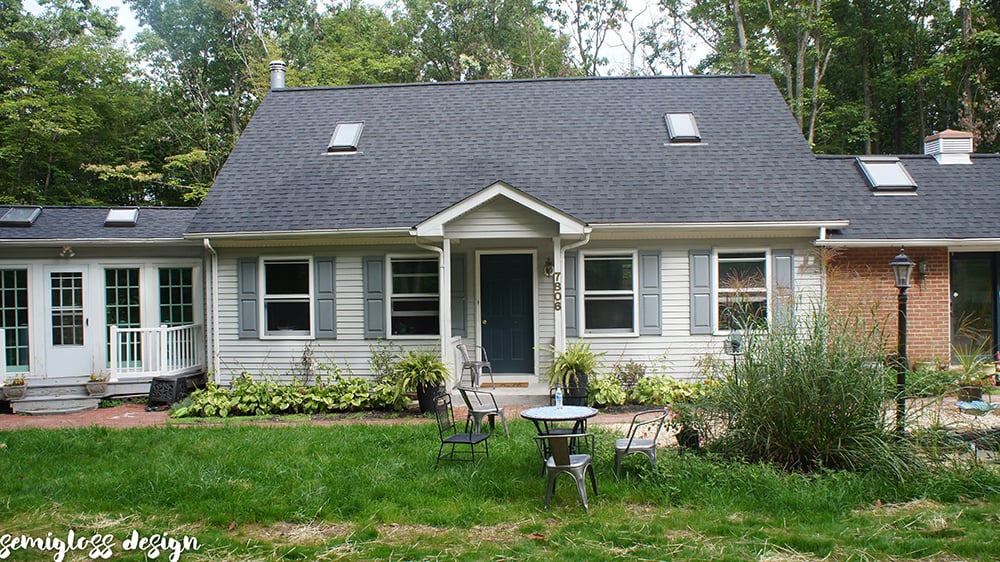 cape cod house before painting shutters and front door