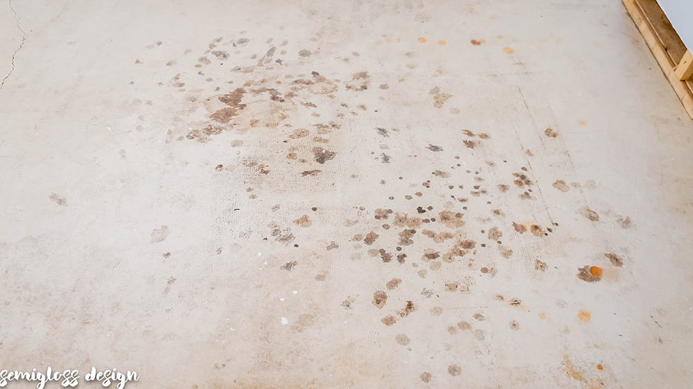 grease spots on garage floor before staining