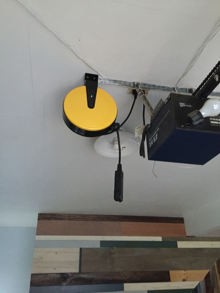 retractable extension cord on garage ceiling