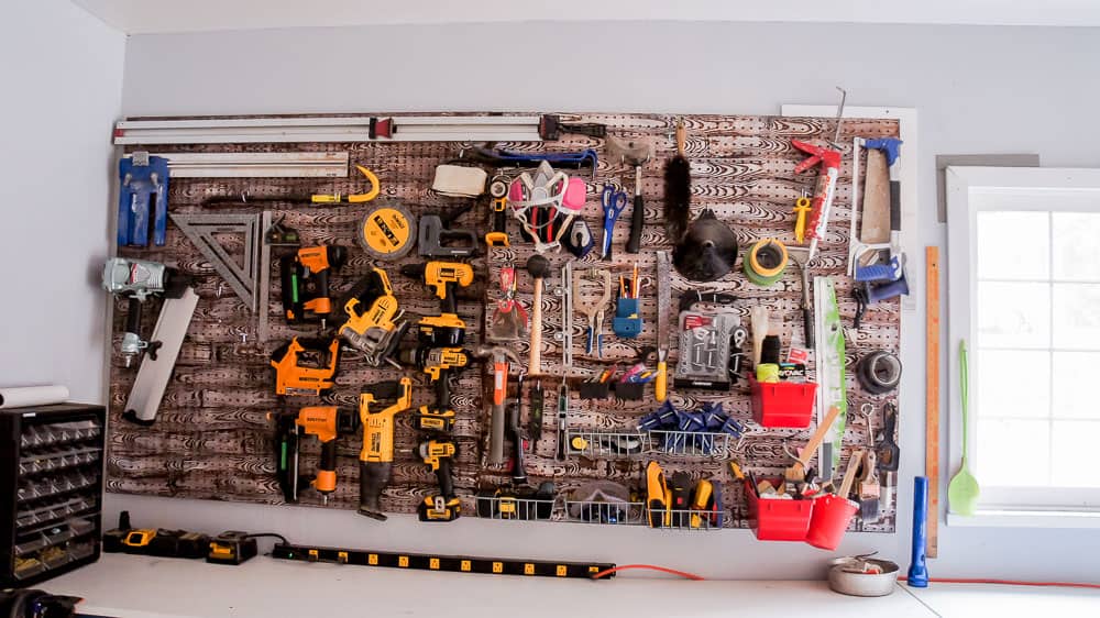 wood grain pegboard DIY to hold tools in garage