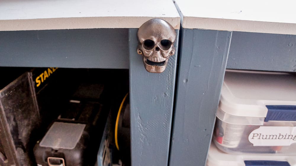 skull bottle cap opener on workbench