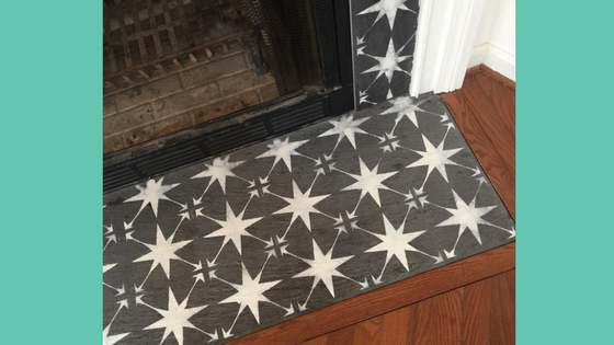 Learn how to paint fireplace tile using a stencil to instantly update your fireplace. This easy fireplace makeover is so easy to do!