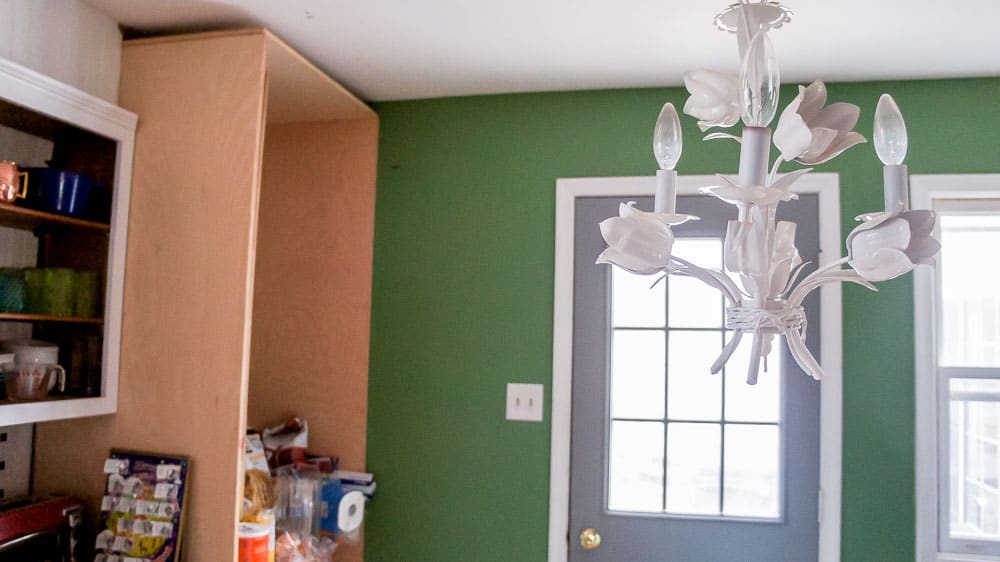 painting raw plywood cabinet in kitchen