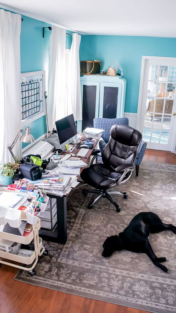 Office makeover plans on a $100 room budget. Using mostly items I already own, I will update my messy office to a vintage filled beautiful space. #officeinteriordesign #officedecor #workspace 