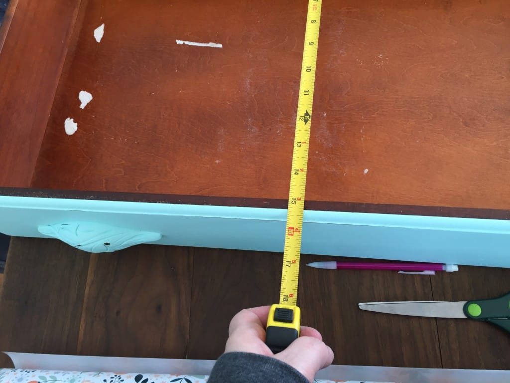 How to add DIY drawer liners to your furniture makeovers using wrapping paper. #furnituremakeover #paintedfurniture #prettypaper