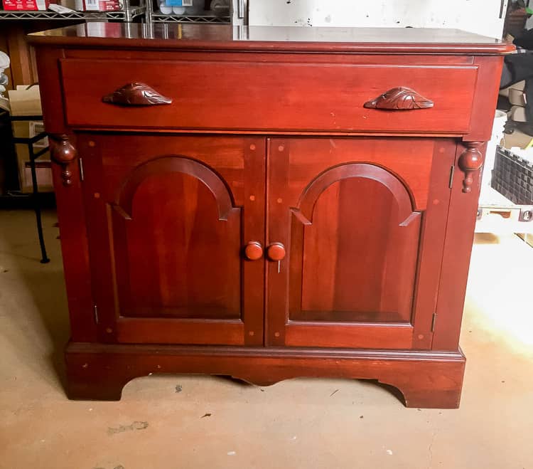 A spring furniture makeover featuring a pastel aqua paint on a credenza. This piece went from stuffy to gorgeous! #painted furniture #fusionmineralpaint #springdecor