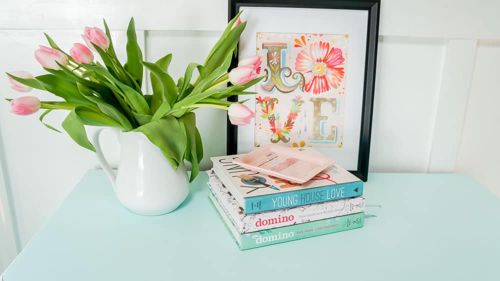 A spring furniture makeover featuring a pastel aqua paint on a credenza. This piece went from stuffy to gorgeous! #painted furniture #fusionmineralpaint #springdecor