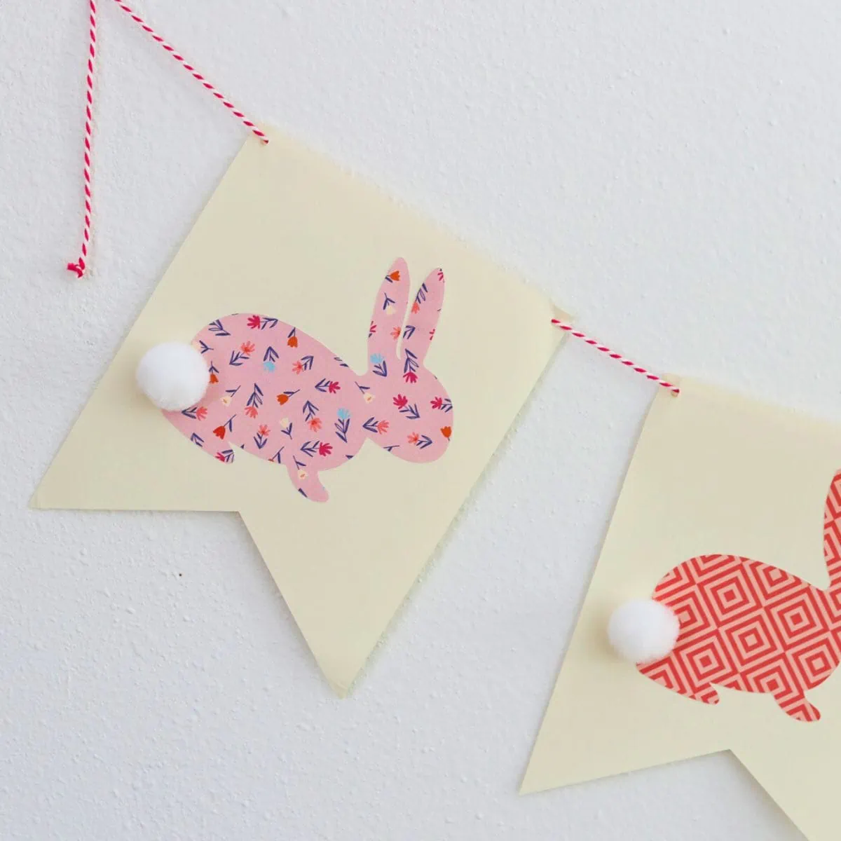 pink floral bunny banner with pompom tail