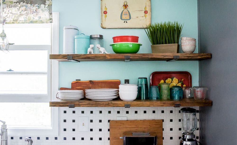 open shelving in kitchen with minimal shelf brackets