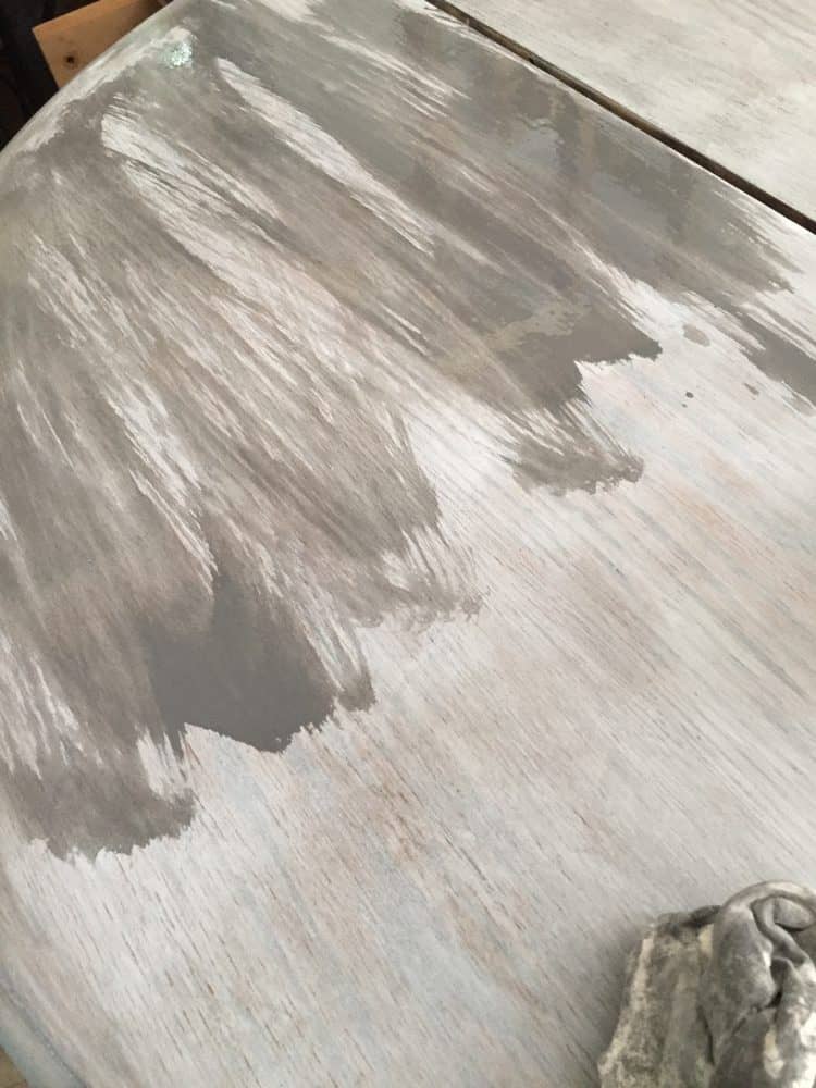 Gray coat of stain over whitewash