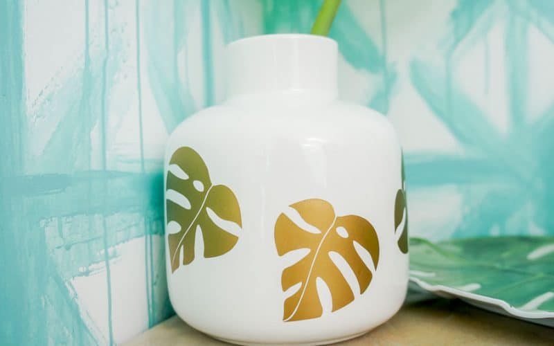 Make an easy summer vase to fill with all of your favorite summer blooms or foliage! This DIY vase features gold monstera leaves for a fun, tropical feel!
