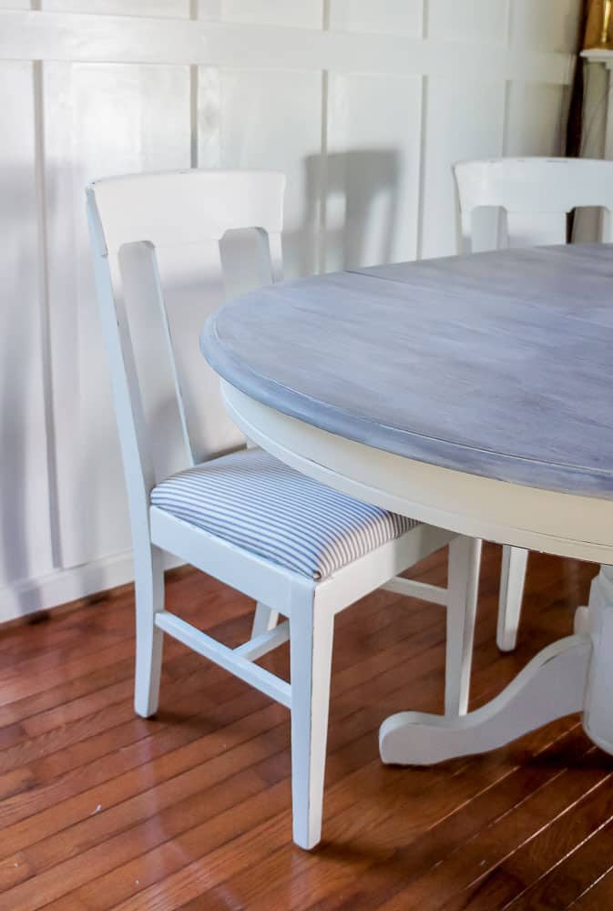 Weathered wood stain pedestal dining table and chairs