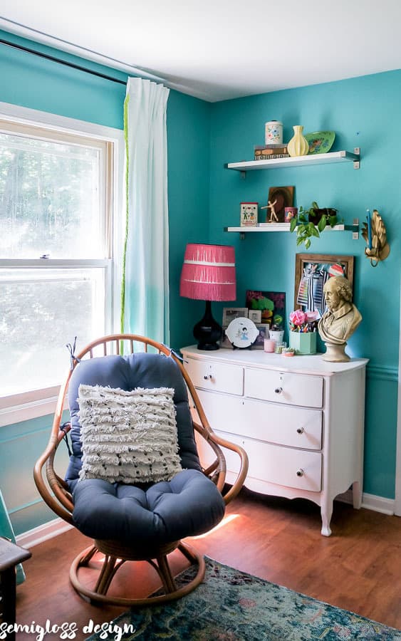 bamboo chair and pink dresser