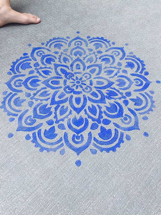 first mandala stencil on rug