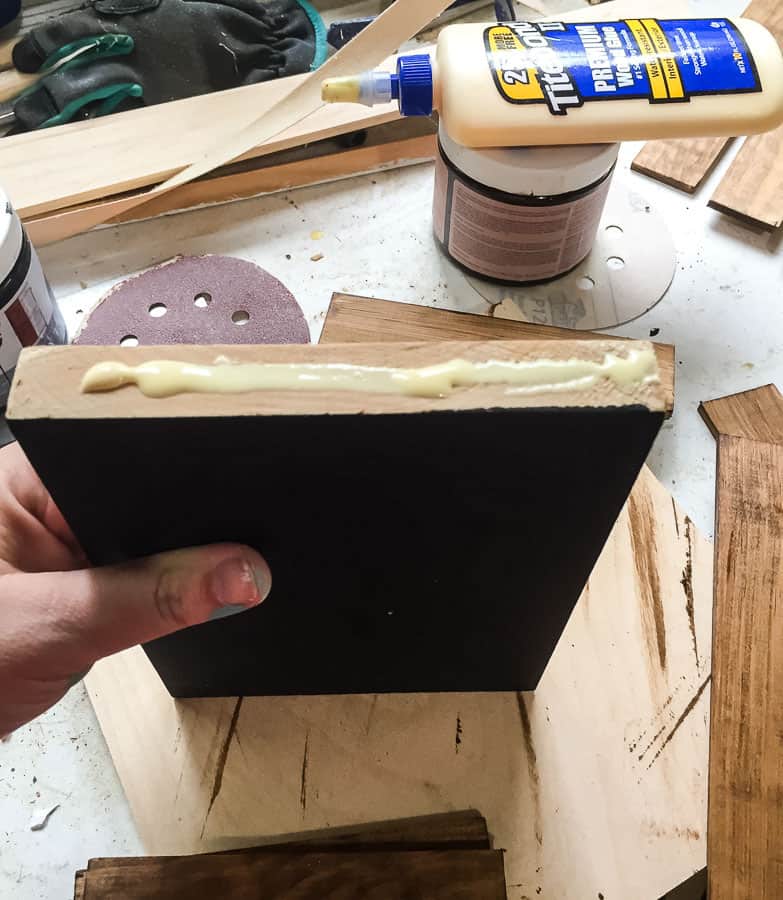 Apply glue to end of scrap wood