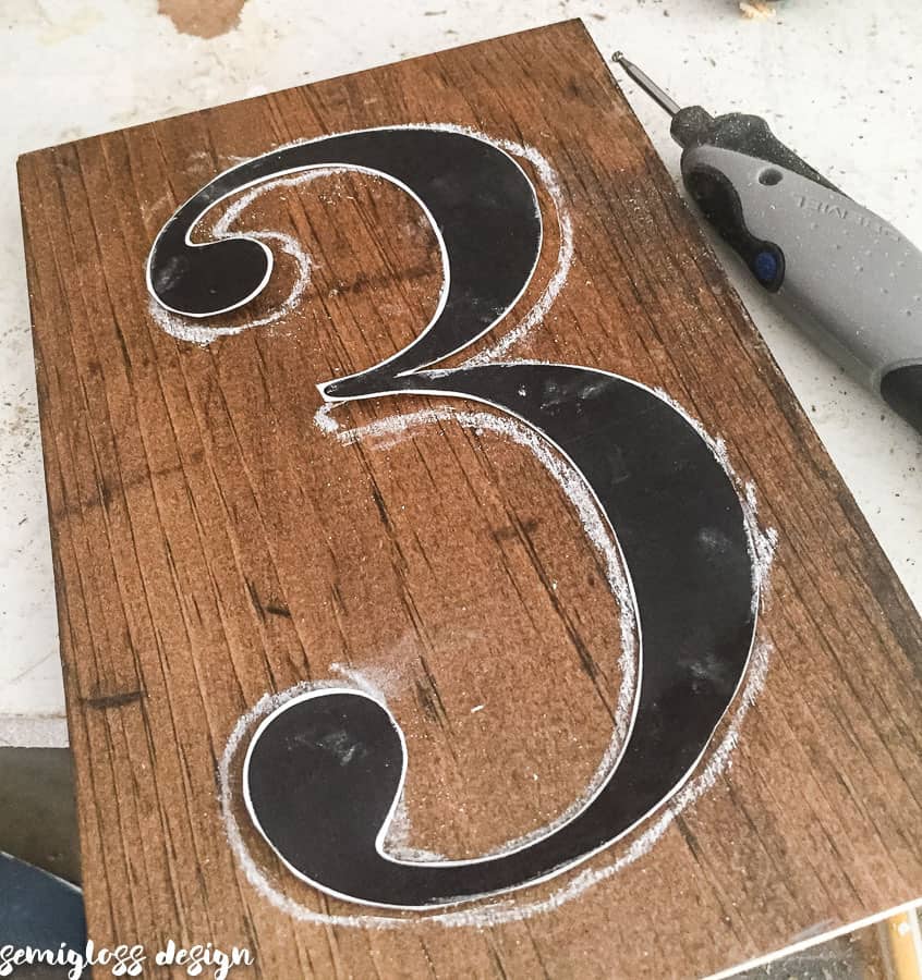 trace cut out number onto wood