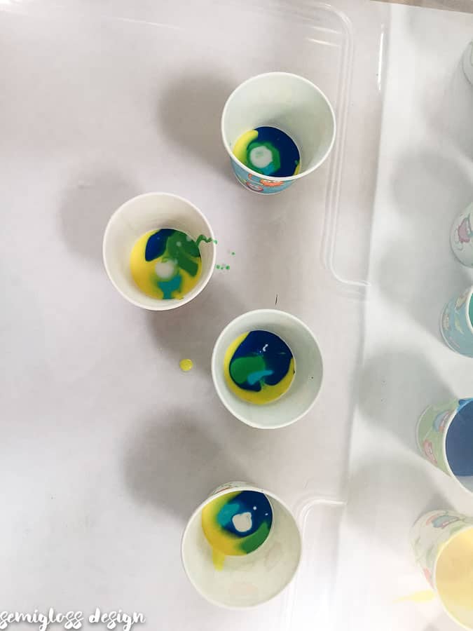 paint pour mixture in cups