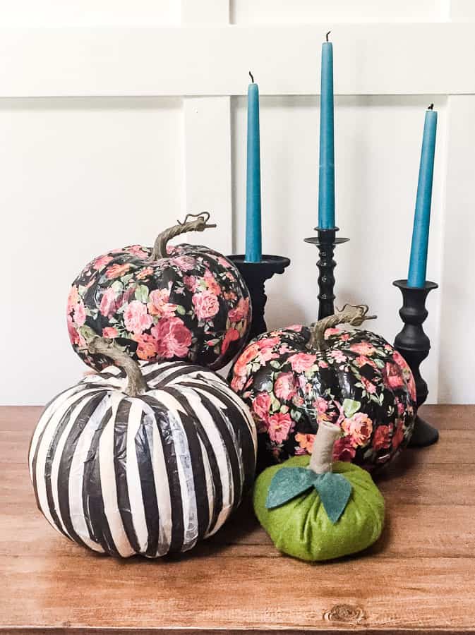 Floral and striped pumpkins made with tissue paper decoupage