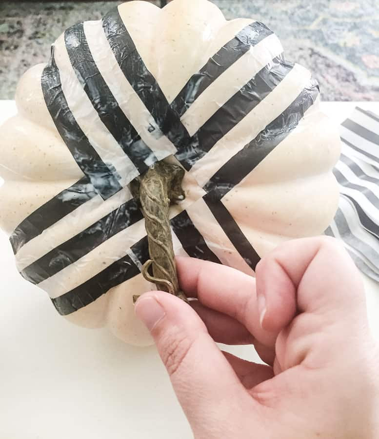 Apply strips of paper in sections until pumpkin is covered