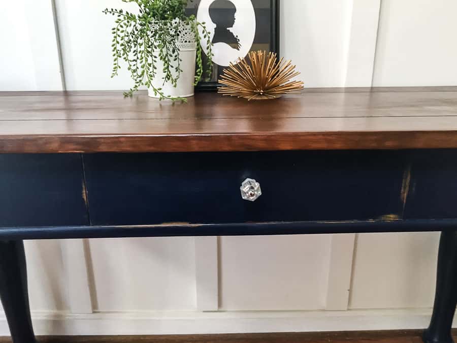 navy console table with distressed edges