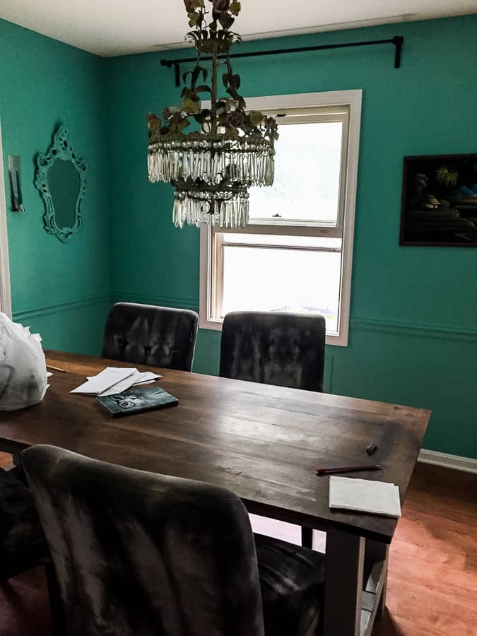 teal painted walls in dining room