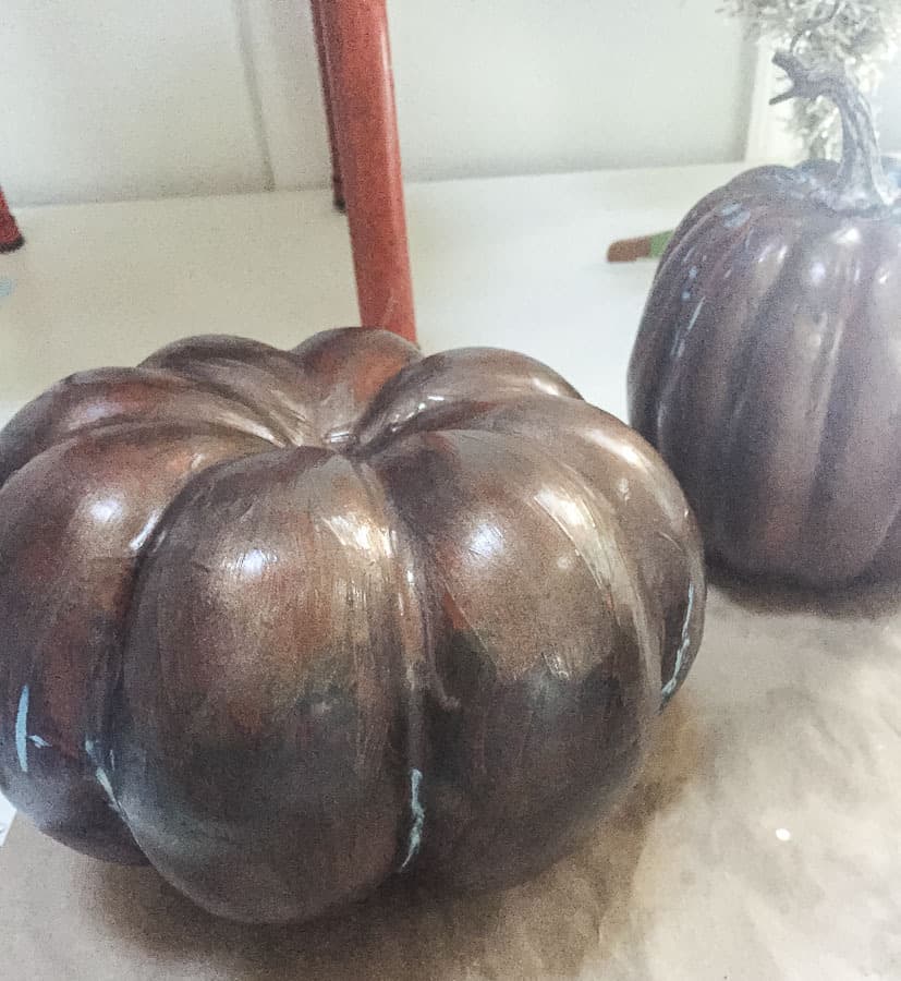 painting pumpkins with bronze paint