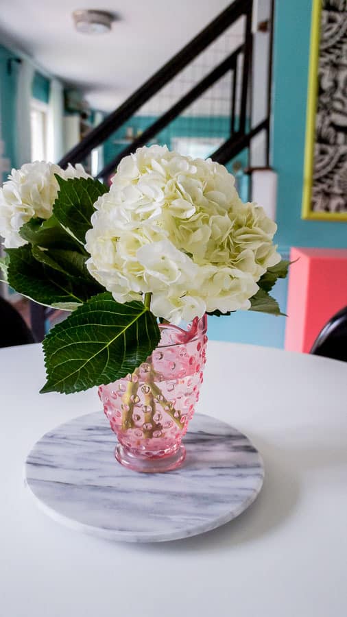 hydrangeas in pink vase