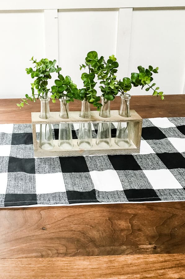 Finished buffalo check table runner with vases