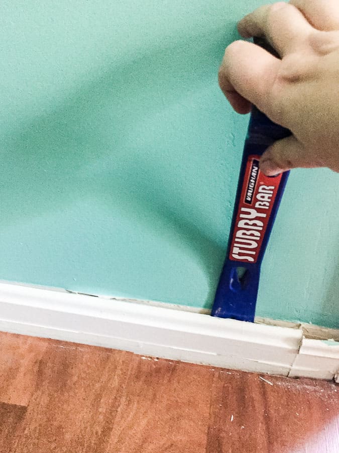 Use pry bar to remove molding